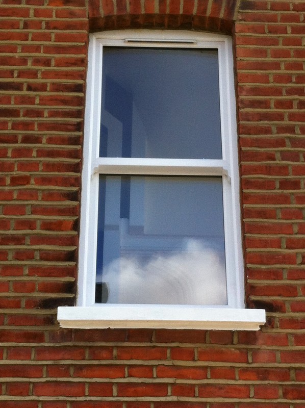 uPVC sash window on Victorian red brick house in Bellingham
